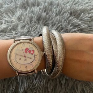 Hello kitty watch with set of silver bracelets